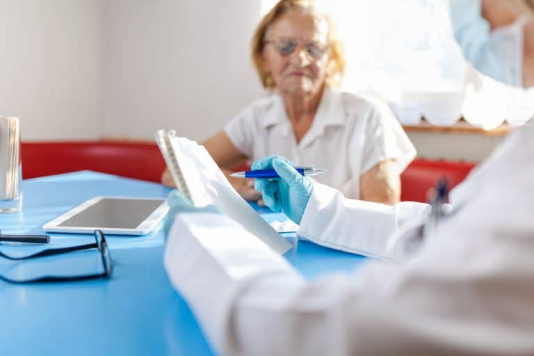 Senior woman during a medical exam with practitioner