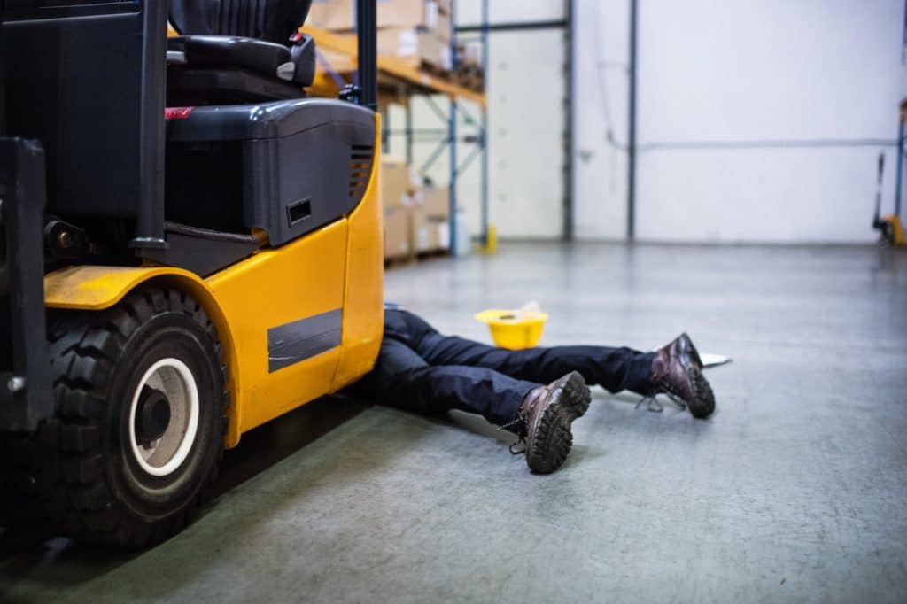 Warehouse Worker After an Accident in a Warehouse.